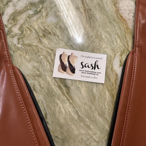 Brown and Black Crossbody Bag with Sleek Design - Picture 3 of 8